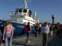 Patsy Dan bidding Sl�n go foill to departing visitors on the Ferry back to mainland Donegal