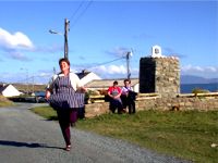 M�ire Bn Mhic Fhionntaigh of Caife an Chreag�in dancing to the music of Patsy Dan Rodgers