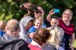 Raptor on a boy's head at Eagles Flying, County Sligo, North West Ireland